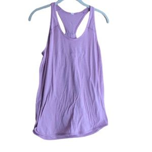 Lululemon muted pink tank top with twist back detail size 4